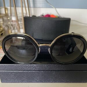 Elegant Black Round Prada Sunglasses